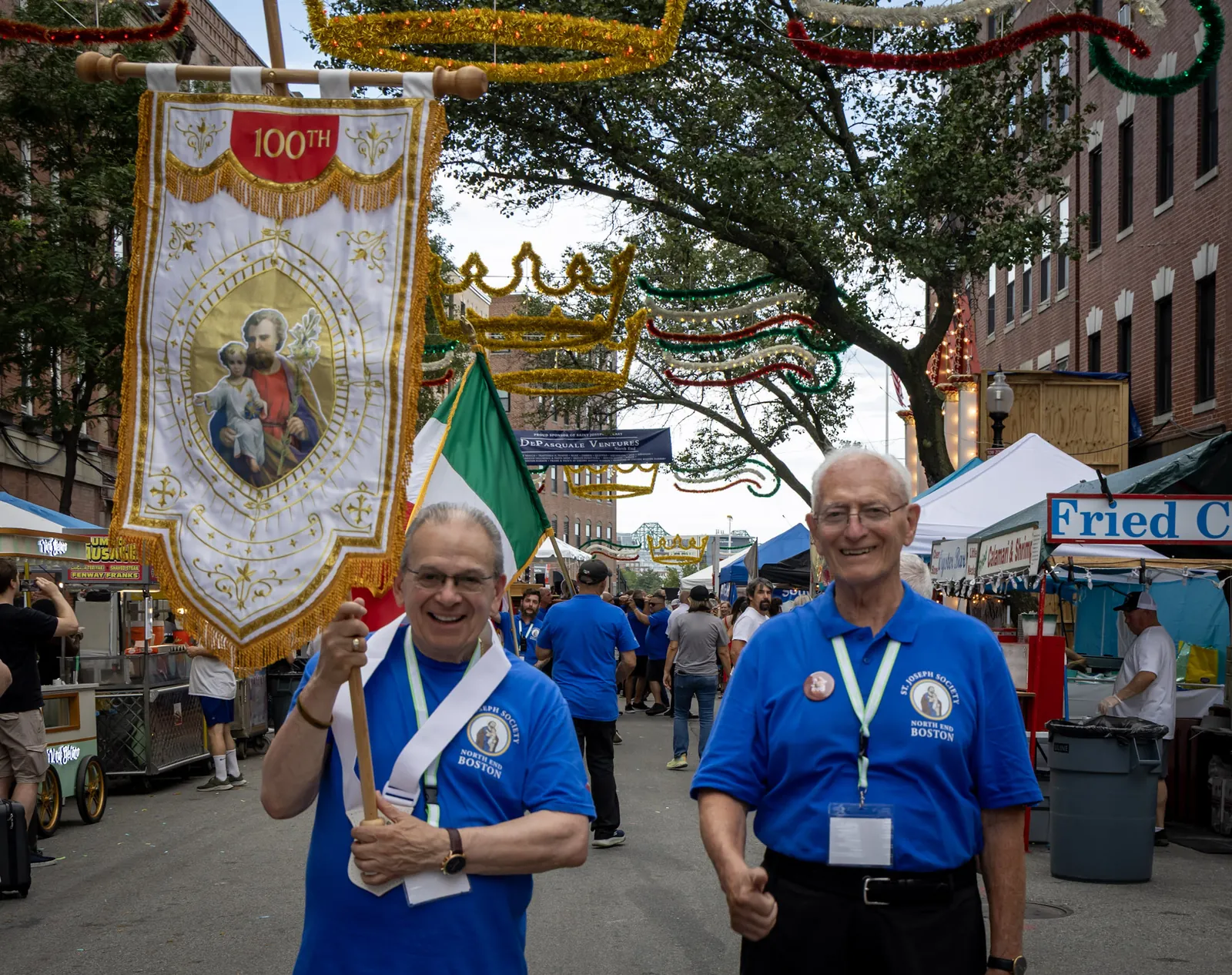 The 100th-anniversary banner in procession