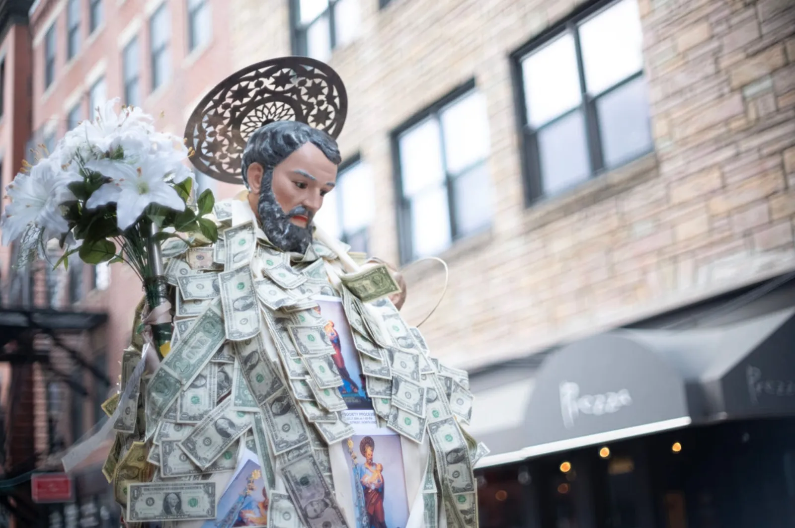 Saint Joseph statue with offerings